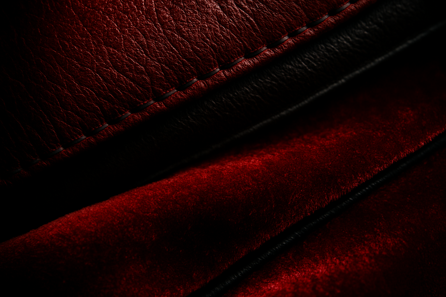 Generate me an image of a closeup on red fancy leather, velvet and dark